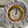Rare Vintage Lladro Marbella Quartz Desk Clock (5652)  crafted from glazed white porcelain with delicate blue floral details and a gold rimmed face. Image 7