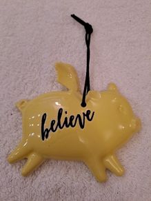 Yellow hanging plaque
