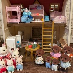 Sylvanian cottage and rainbow nursery bus with extras