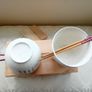 Noodle Bowls Japanese Flower  Set of two noodle bowls boxed in a wooden crate with 2 pairs of chop sticks. These are a great idea for a new home or perhaps the kids setting our on their own. Attractive on the table giving a genuine oriental feel. Weight ( Image 5