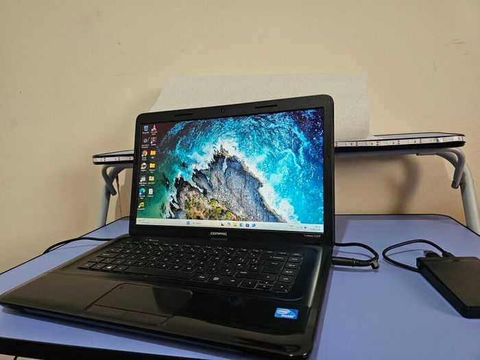 HP Compaq CQ58 Laptop Intel Celeron, 8GB RAM, Samsung 128GB SSD + Extra Storage Toshiba 750GB External USB HDD.