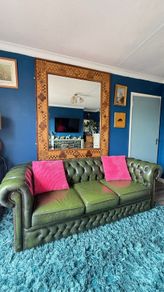 Chesterfield antiqued leather racing green sofa