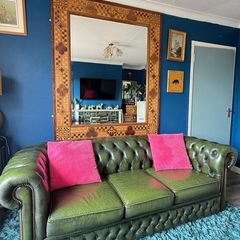Chesterfield antiqued leather racing green sofa
