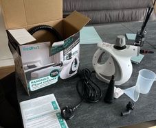 Hand held steamer
