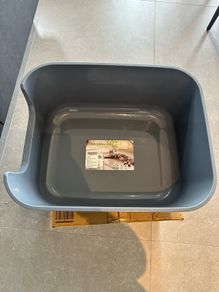 Grey cat litter box with high sides