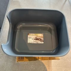 Grey cat litter box with high sides