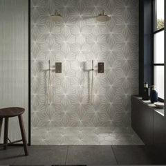 Grey tiles, adhesive and grout
