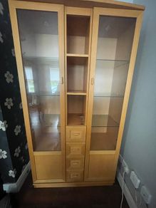 Glass display cabinet with spotlights