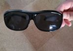 Sunglasses fits over prescription glasses