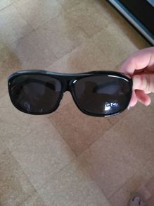 Sunglasses fits over prescription glasses