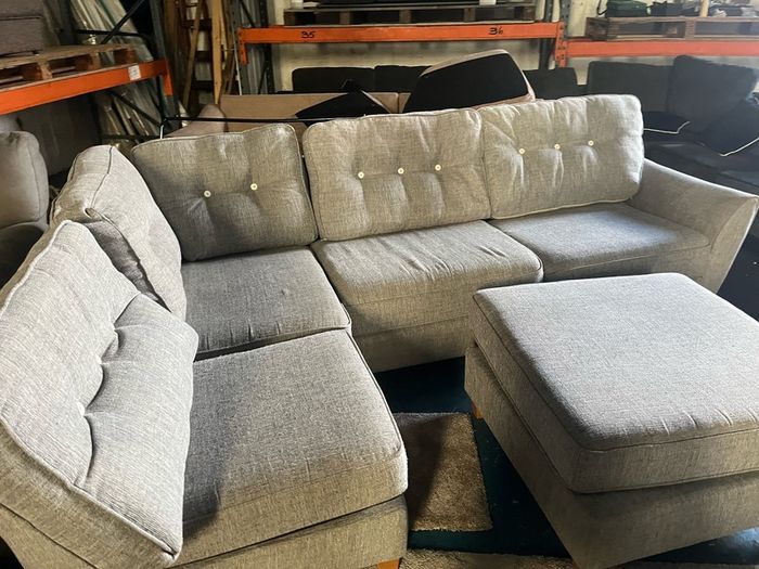 Grey corner sofa with matching footstool