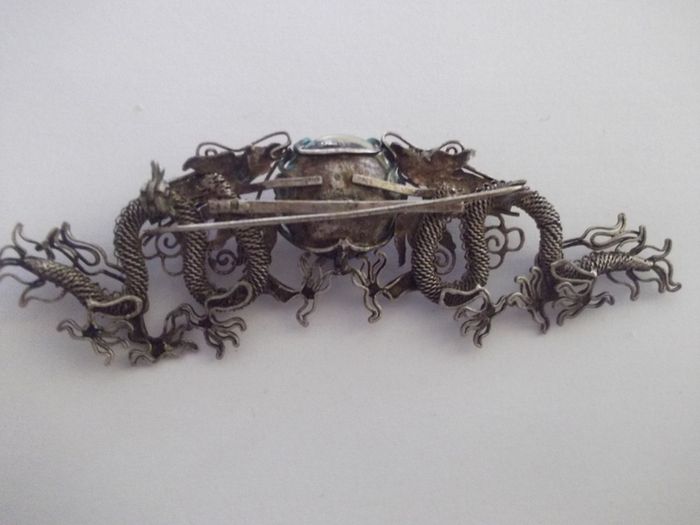 a vintage silver chinese filigree brooch