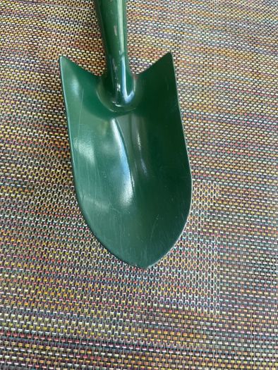 Vintage garden trowel with wooden handle