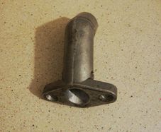 Carburetor inlet manifold for petrol bicycle