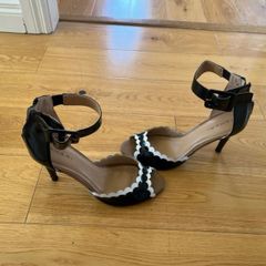 Black and white heels