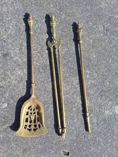 Vintage brass fire dogs and heavy companion set