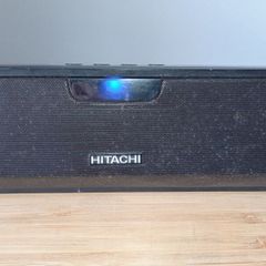 The Hitachi AXS014BTU is a compact 30W 2-channel TV soundbar featuring Bluetooth