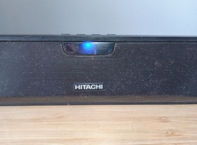 The Hitachi AXS014BTU is a compact 30W 2-channel TV soundbar featuring Bluetooth