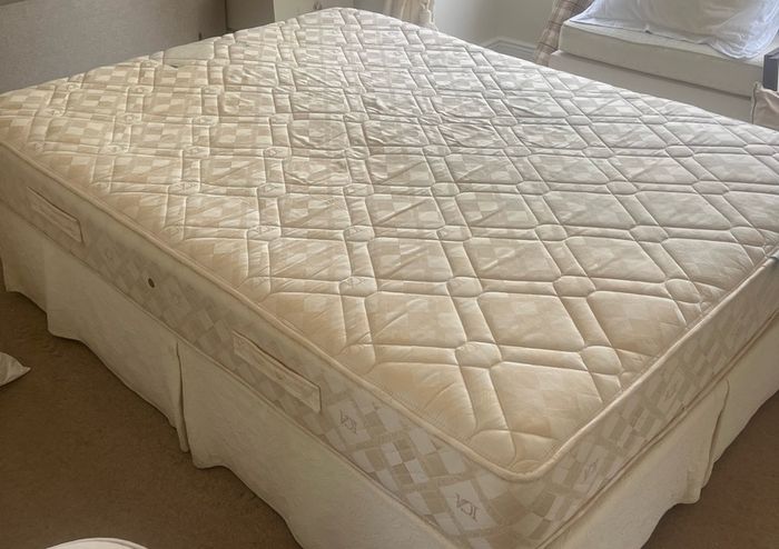 King size bed with optional mattress included.