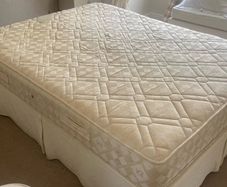 King size bed with optional mattress included.