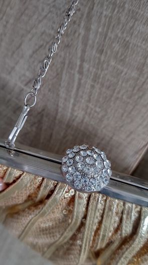 Gold sequin with rinstones clutch
