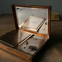 Vintage Agme made in Switzerland Reuge Ste Croix musical powder compact. 1950s