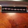 Stg silver bracelet, ruby and diamond colour gemstones Image 10