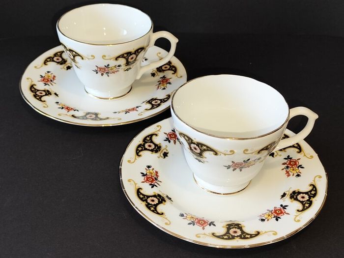 A Pair of Royal Sutherland Bone China Teacups and Saucers in the Balmoral Pattern