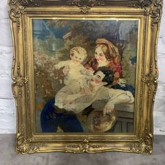 A Large 19th century plumage tapestry in a heavy guilt frame.