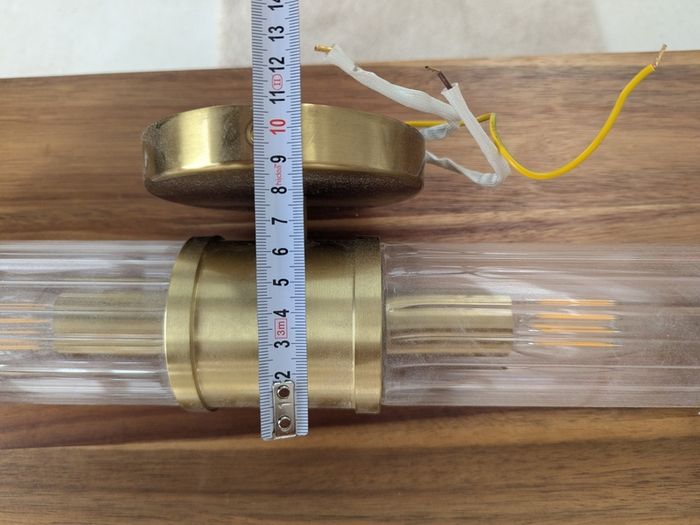 Brass reeded glass wall light