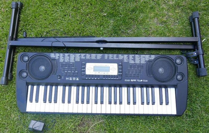 Electronic Keyboard - SK-560 54 Key Keyboard, and keyboard stand