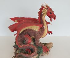 Red dragon figure on rock ceramic 19 cm high