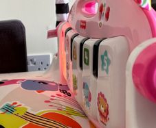 Fisher-Price Glow And Grow Kick & Play Piano Gym Pink