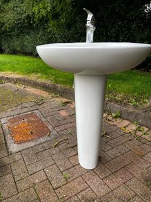 bathroom sink and pedestal