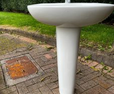 bathroom sink and pedestal