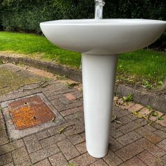 bathroom sink and pedestal