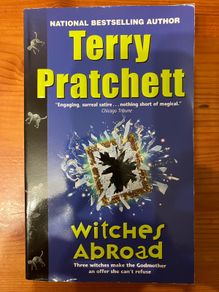 Fantasy book:'Witches Abroad' by Terry Pratchett
