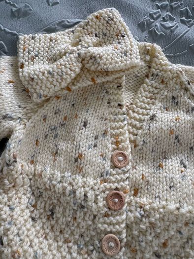 hand knitted baby blankets and cardigans