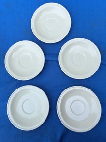 5 vintage white Carrigdhoun Co-Op saucers