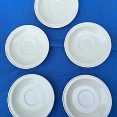 5 vintage white Carrigdhoun Co-Op saucers