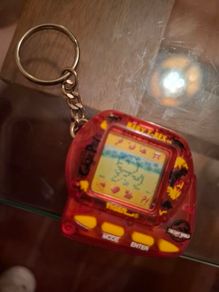 Jurassic Park The Lost World Tamagotchi Giga Pets Baby T-Rex 1997