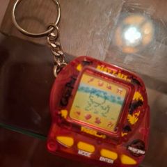 Jurassic Park The Lost World Tamagotchi Giga Pets Baby T-Rex 1997