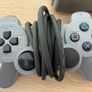 PlayStation console, Dual Shock controller, and all cables Image 2