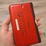 Red Nintendo 3DS xl and Aqua Blue Nintendo 3DS Image 8