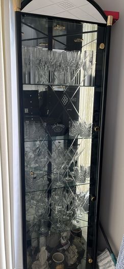 Table and chairs and glass cabinet