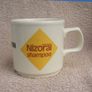 NIZORAL SHAMPOO (Janssen) - a scarce promotional mug made by Carrigdhoun Co-Op pottery of Carrigaline, County Cork (late 1980s) Image 2