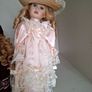 3 Leonardo Collection porcelain dolls with stands / rocking horse display collectors dolls. Image 3