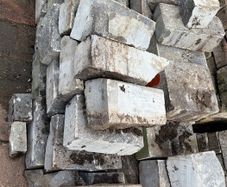 Mixed sizes of cut limestone blocks