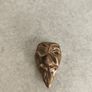 Small Brass metal masks. Image 5