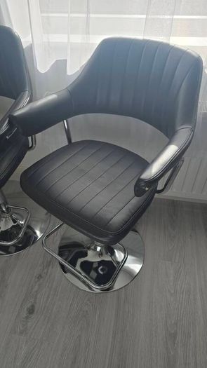 Adjustable black faux leather swivel bar stool with a metal base x3